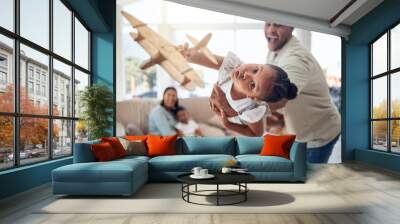 Father, girl or playing with toy airplane in family home or house living room for exciting game, travel dreams or fantasy. Playful portrait, plane or fun child bonding with man, dad or lifting parent Wall mural