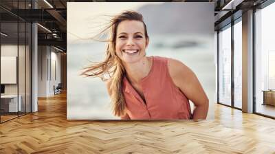 Happy, smile and portrait of a woman at the beach for freedom, travel and peace on holiday in Indonesia. Ocean, happiness and girl by the water at the sea during a vacation to relax in summer Wall mural