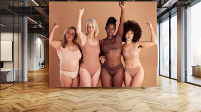 Power, portrait and women in studio for beauty, natural and different, proud and body positivity on brown background. Face, friends and acceptance by inclusive group support, community and self love Wall mural