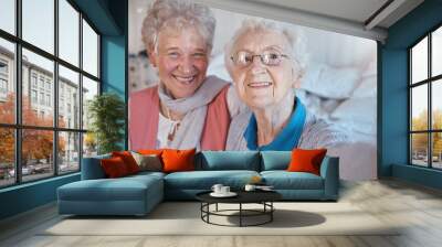 Senior women, friends and selfie with a smile, happiness and care during a visit or lifestyle in a nursing home together. Face portrait of old people happy about retirement, support and trust Wall mural