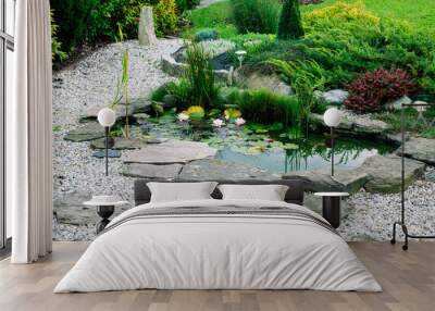 Garden architecture. garden pond. ornamental bushes. Wall mural