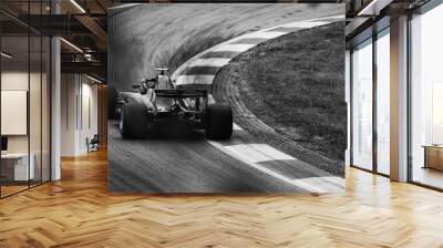 F1 race car on the road, driving into the corner Wall mural