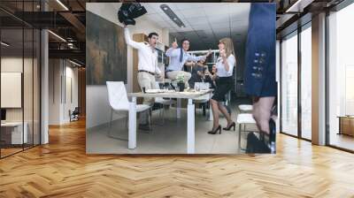 chief arriving to office while workers dancing in party Wall mural