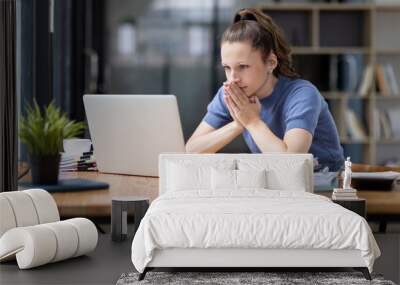 Portrait of tired young business Canada woman work with documents tax laptop computer in office. Sad, unhappy, Worried, Depression, or employee life stress concept Wall mural