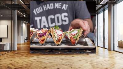 man enjoying tacos and a margarita outside in summertime Wall mural