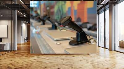 Row of infrared scanners and computers sitting at  a registration desk Wall mural