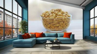 peanuts in a glass bowl Wall mural