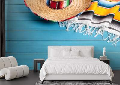 Mexican background serape striped blanket with sombrero maracas on old blue wood floor Mexico cinco de mayo festival vacation photo Wall mural