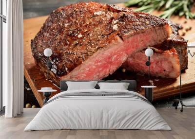 medium rare ribeye steak on wooden board, selected focus Wall mural