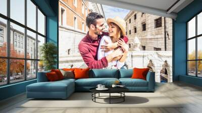 Beautiful romantic couple having fun in Venice city - Tourists traveling in Italy together in famous sightseeing - Holidays and happy lifestyle concept Wall mural