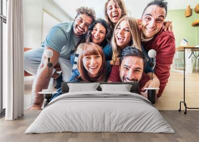 Group of happy friends taking selfie at home - Business colleagues during break from work taking selfie picture in office relaxation area at startup office Wall mural