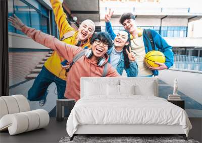 Multiracial students going back to school - Happy teenagers having fun in university college campus - Scholarship concept Wall mural