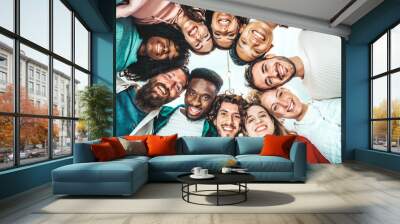 Portrait close up picture of happy faces young friends standing in circle and looking at camera - Millenial diverse people taking selfie photo - Life style concept with guys and girls hugging together Wall mural