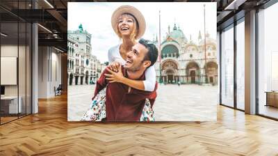 Romantic young couple enjoying vacation in Venice, Italy  Wall mural