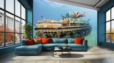 Sunken wreck of a tank in Aqaba, Red Sea, Jordan. Wall mural