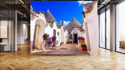 Alberobello, Puglia, Italy: Typical houses built with dry stone walls and conical roofs Wall mural