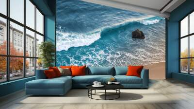 A wave breaking on a beach in central California. Wall mural