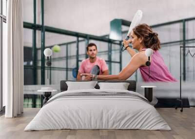 mixed padel match in a padel court indoor Wall mural