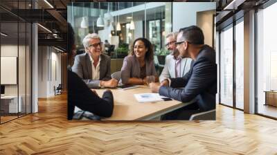 A diverse group of Black, White, Hispanic, and mixed individuals collaborate in a business meeting. Ideal for themes of workplace diversity, teamwork, and professional success. Wall mural