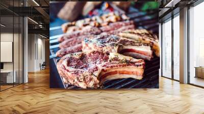 Large pieces of pickled meat on a grid in a restaurant.  Wall mural