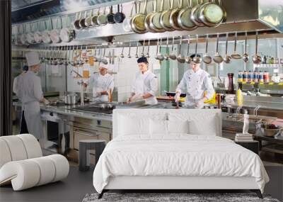 Modern kitchen. The chefs prepare meals in the restaurant's kitchen. Wall mural