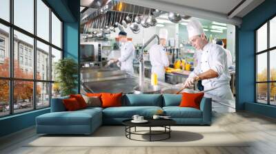 Modern kitchen. The chefs prepare meals in the restaurant's kitchen. Wall mural