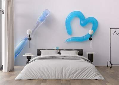 Dental health concept with toothbrush tube and toothpaste heart detail Wall mural