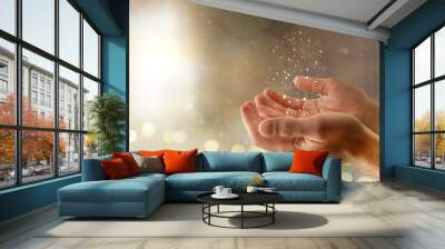 Praying religious hands concept with glitters and lights background Wall mural