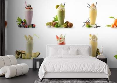 Set of milkshakes decorated with fruits of various flavors isolated Wall mural