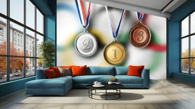 Set of Olympic medals hanging with background with olympic rings Wall mural