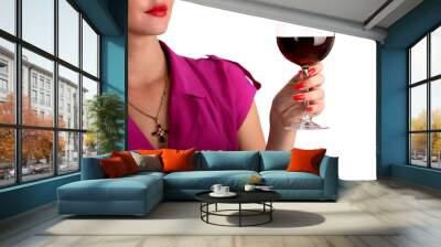 Woman holding a glass of red wine focus on the glass Wall mural