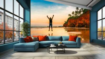 Happy summer lifestyle man traveler jump on Red Cliff beach Bang Saphan Noi, Active tourist male joy fun travel Prachuap Khiri Khan Thailand vacation trips, Tourism beautiful destinations place Asia Wall mural