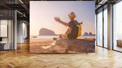 Happy young Asian traveler man joy fun on summer vacation at sunset Pak Meng beach, Leisure outdoor lifestyle tourist travel Trang Thailand beach, Tourism beautiful destination place Asia holiday trip Wall mural