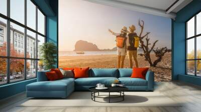 Outdoor lifestyle couple traveler joy looking beautiful nature scenic sunset Pak Meng beach, Attraction landmark tourist travel Trang Thailand beach summer holiday vacation, Tourism destination Asia Wall mural