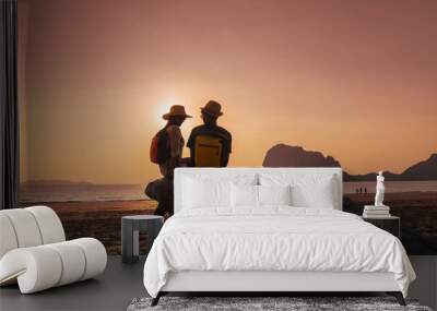 Romantic couple traveler joy look beautiful nature at sunset Pak Meng beach Outdoor lifestyle attraction travel Trang Thailand exotic beach Tourist on summer holiday vacation, Tourism destination Asia Wall mural