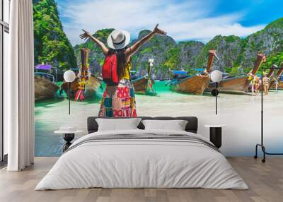 Traveler woman in summer dress joy relaxing on sunny beach Maya bay Phi Phi island Krabi, Travel Phuket Thailand fun beach, Tourism beautiful destination place Asia, Girl on holiday vacation trip Wall mural