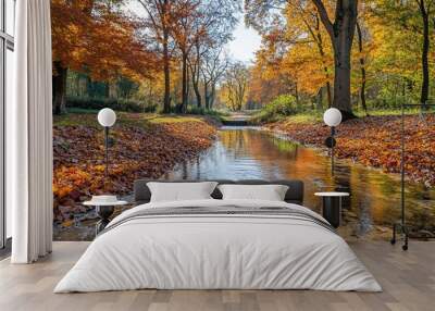 A serene autumn landscape featuring a tranquil stream and colorful foliage. Wall mural