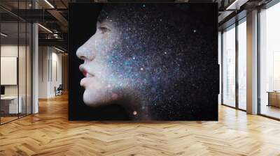 Unique double exposure of a woman's portrait and shining light particles creating a magic sparkling effect Wall mural