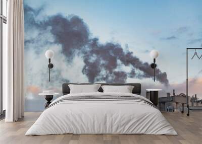 Industrial district and smoke polluting the air. Lithuania Europe. day time at winter season. Wall mural