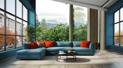 View of out of window of beautiful landscape, ominous sky and mountains in the background. Windermere, Lake District, Cumbria, UK -Image Wall mural