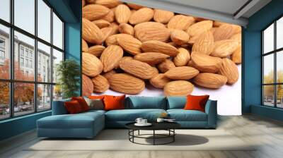 Almonds isolated. Group of almond nuts isolated on white background. Full depth of field Wall mural