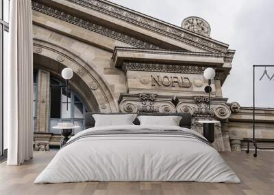 Architectural fragments of North Station (Gare du Nord, 1864) - one of the six large termini in Paris, largest and oldest railway stations in Paris. France. Wall mural