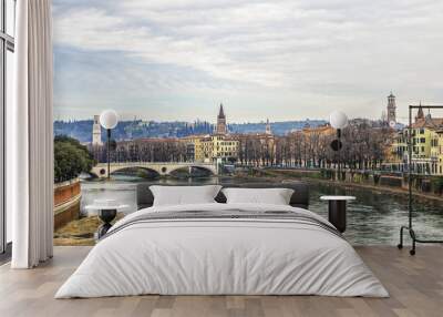 Beautiful panorama of Adige River waterfront in Verona, Italy. Wall mural