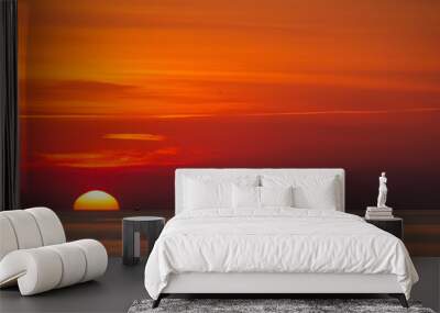 An early morning shrimp boat at sunrise with orange sky Wall mural