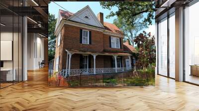 An Old Abandoned Home Behind Silt Fence for Renovation Wall mural