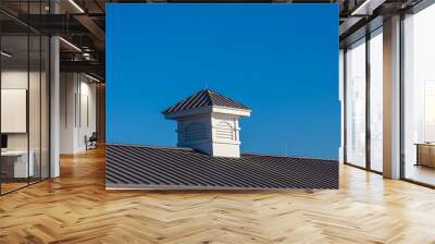 wood cupola on an old pier roof under blue sky Wall mural