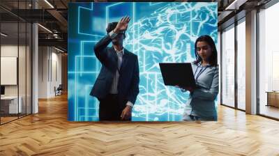 Engineers use VR smart goggles and AI neural networks to solve company problems. IT experts using artificial intelligence and AR virtual reality tech to visualize startup business data, camera B Wall mural