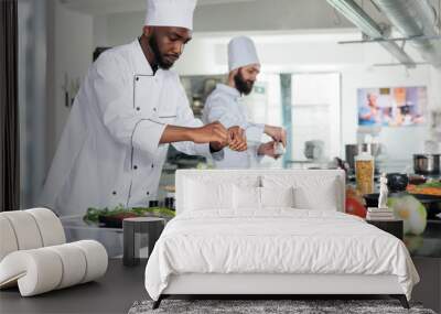 gastronomy expert wearing cooking uniform while preparing delicious gourmet dish for dinner service  Wall mural