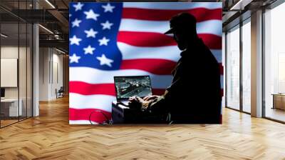 Military operative uses laptop to analyze surveillance data, standing isolated over USA flag background. Soldier engaged in geopolitical operation, protecting national borders Wall mural