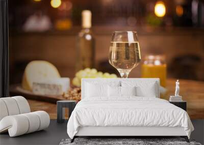 Photo of a sparkling white wine on a rustic wooden table in a vintage pub Wall mural